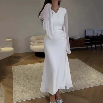 Elegant white dress for women with bell sleeves